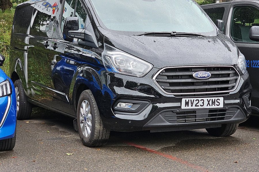 Black Ford Tourneo Custom eight-seater minibus